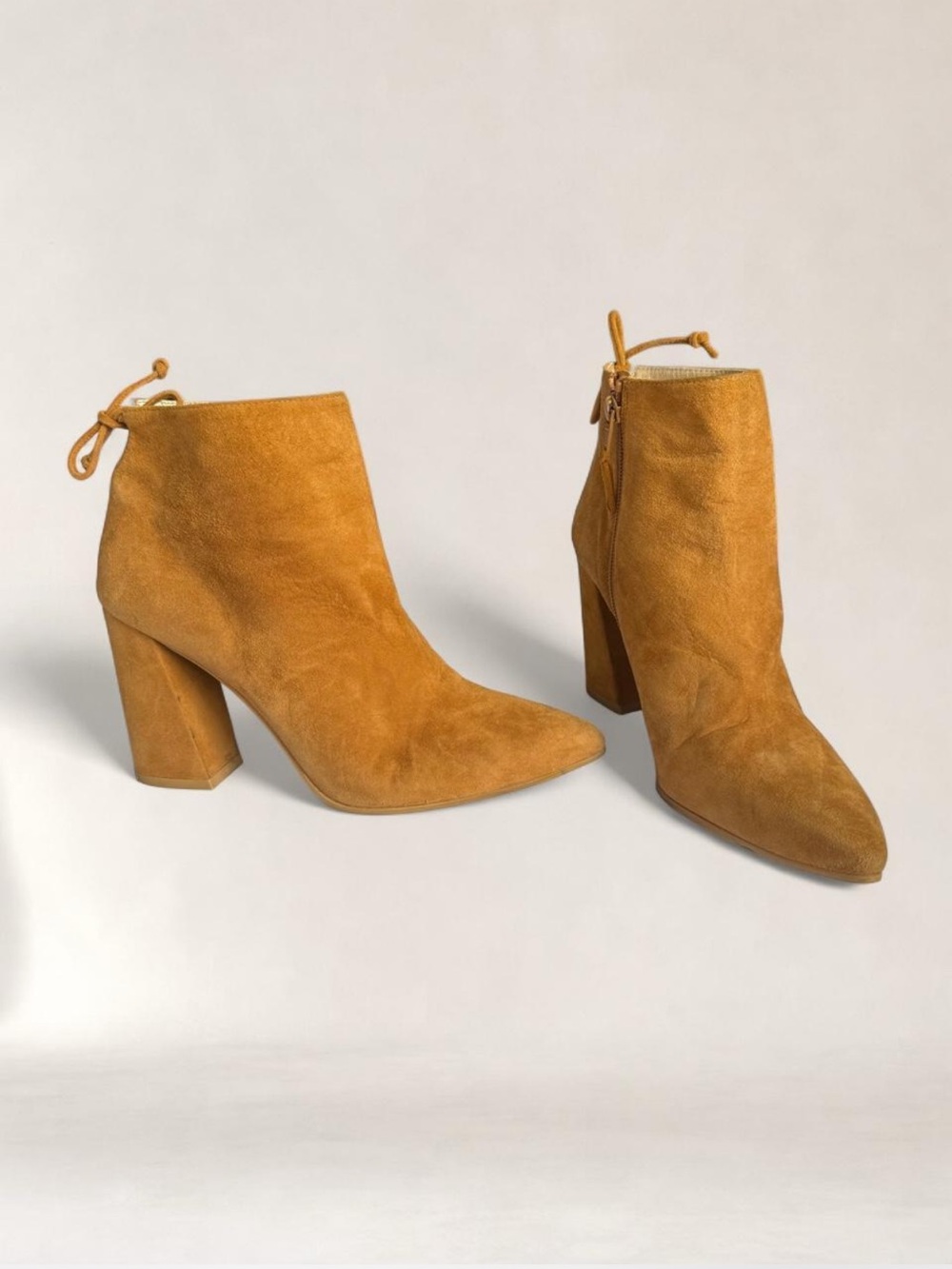 STUART WEITZMAN
Grandiose camel suede ankle boots
Size 8
